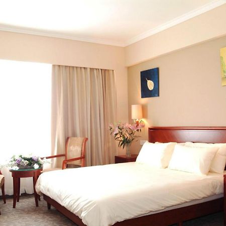 Greentree Inn Shanghai Dongming Road Subway Station Express Hotel Esterno foto